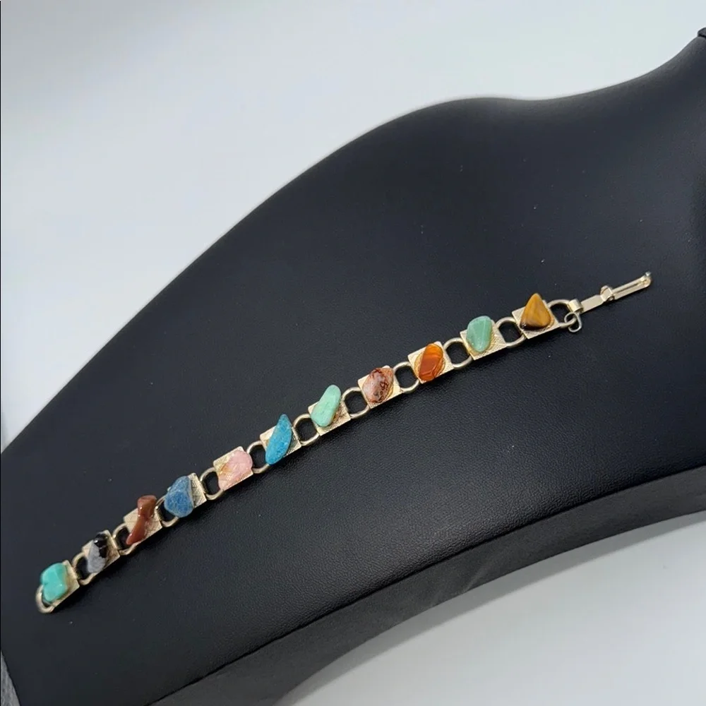 Vintage Gold tone link charm bracelet with various colored “stones” boho hippie